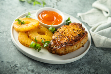 Grilled turkey with pineapple and mango sauce