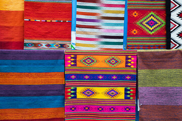 Traditional Mexican pattern on the carpet. Handmade. Woven colorful sarapes 
