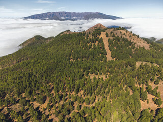 Mountain trail above the clouds on La Palma island. Aerial view.