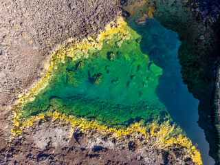 Colorful ponds on Playa de Echentive on La Palma island. View from above