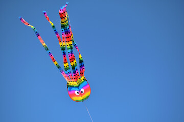 kite flying in the sky - LGBT colors