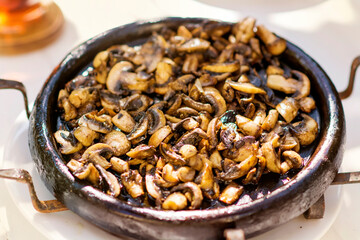 Plate of Cooked Mushrooms in a Restaurant