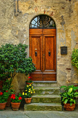 Fototapeta na wymiar Tuscan Door with Flowers