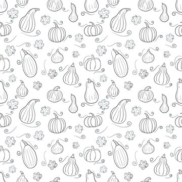 Seamless linear natural pattern of pumpkins and leaves in doodle style