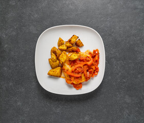 a plate with celery tomato sauce and potato