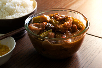 Braised pork with bitter gourd Chinese food with steamed rice