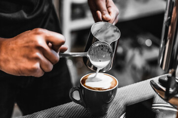how to make cappuccino coffee by barista focus in milk and coffee
