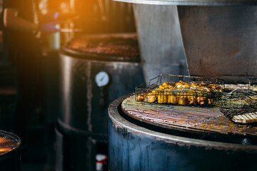 Cooking vegetables on the grill in the kitchen at the restaurant