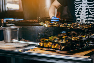 Cooking vegetables on the grill in the kitchen at the restaurant