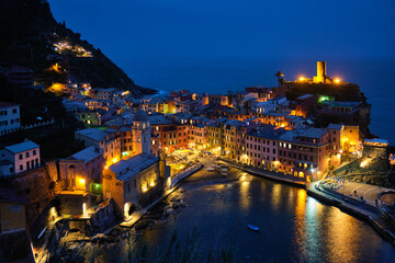 Fototapeta na wymiar Vernazza village illuminated in the night, Cinque Terre, Liguria, Italy