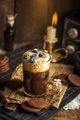 cup of coffee with cinnamon and anise