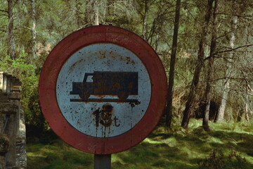 Old traffic sign in nature 