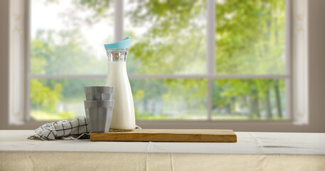 Obraz premium Fresh cold milk and home interior 