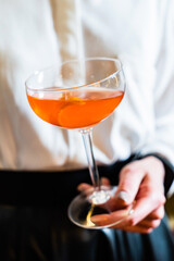 mocktail in the woman's hands
