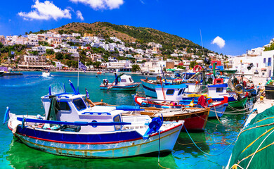 Fototapeta na wymiar Traditional Greece - charming fishing village with colorful boats,Leros island in Dodecanese