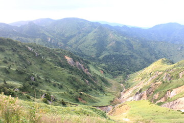 Fototapeta na wymiar 志賀高原の夏。横手山より望む信州の山々。 