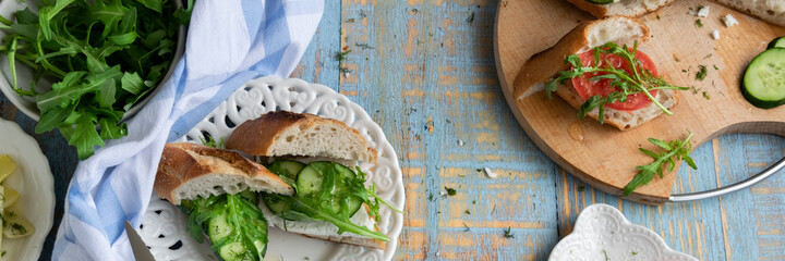 Summer cold sandwiches with fresh vegetables and goat cheese. Homemade healthy snack