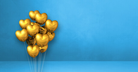 Gold heart shape balloons bunch on a blue wall background. Horizontal banner.