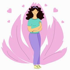 A woman stands and hugs herself and smiles.