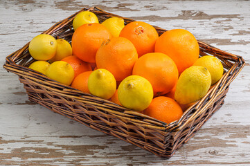 lemons and oranges in a basket