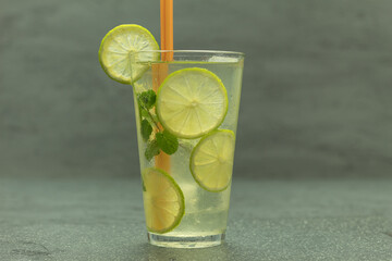 Cool drink with lime, ice and mint