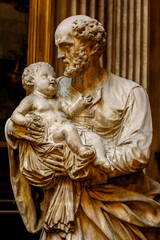 Saint Philippe du Roule church, Paris, France.  Saint Joseph holding baby Jesus
