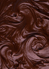 Naklejka premium Food texture of melted chocolate or spread.