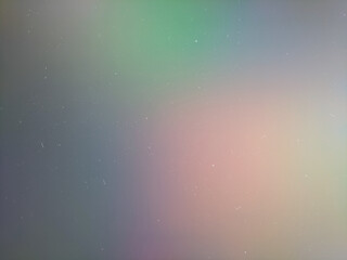 soft, blurry iridescent highlights creating a gradient