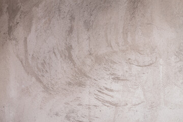 Gray background of cement plaster on the wall of the house