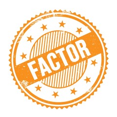 FACTOR text written on orange grungy round stamp.