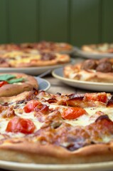 Pizza restaurant pizzas with different toppings