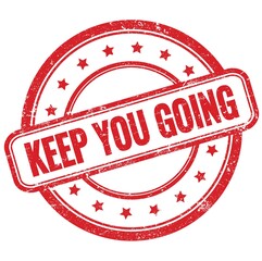 KEEP YOU GOING text on red grungy round rubber stamp.