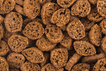 Close up photo of crispy rye crouton bread biscuits. Top view high resolution macro photo.