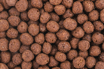 Fototapeta na wymiar Close up photo of chocolate corn balls. Top view high resolution macro photo.