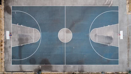  Top down view of public basketball court. School college with Basketball court © dechevm