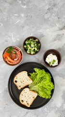 Gluten-free bread, vegetables, and salmon slices