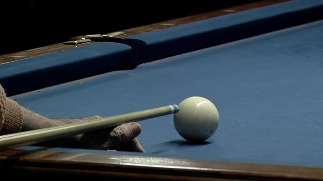 Man playing Five-pin Billiards, Bowling Pins and Balls in Buenos Aires, Argentina. Close Up.  