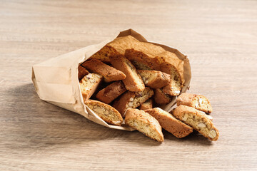Traditional Italian almond biscuits (Cantucci) on wooden table