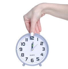 Table clock alarm clock in hand on white background isolation