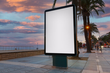 Blank billboard next to the beach