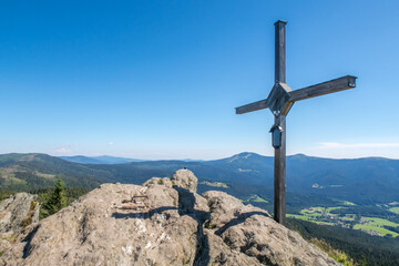 Fototapeta na wymiar landscape in the mountains, peak with rock and cross - Germany, Nationalpark Bayerischer Wald