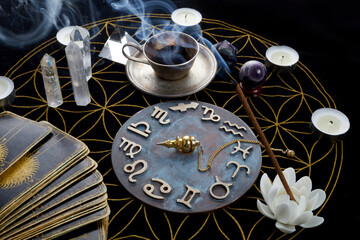 Fortune Telling Table with tarot cards and esoteric objects
