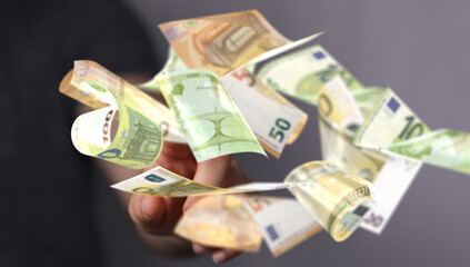 bill euro banknote in hand rain