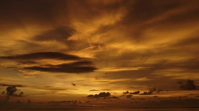 SERIES Red orange sunset sky orange video 4k cloud Red orange cloudscape time lapse background Dark red purple sunset sky cloud time lapse 4k evening clouds moving away rolling Phuket Thailnad.