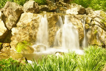Water rushes down a waterfall.