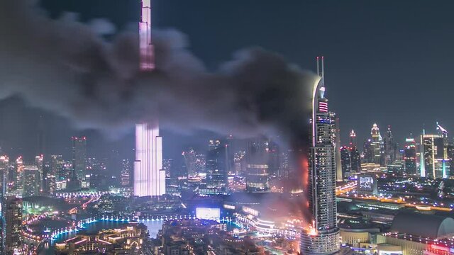 Huge Fire accident occured from the The Address Hotel and Dubai Burj Khalifa before New Year 2016 fireworks celebration timelapse on January 1,2016 at Dubai, UAE. View from top