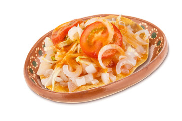 Delicious Mexican snacks in traditional clay plate