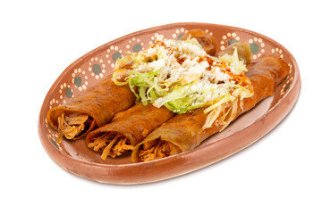 Delicious Mexican snacks in traditional clay plate