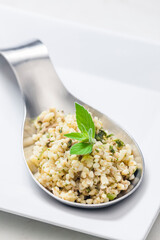 still life of bulgur salad with mint