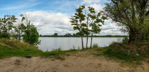 wide river landscape scene with large body of water